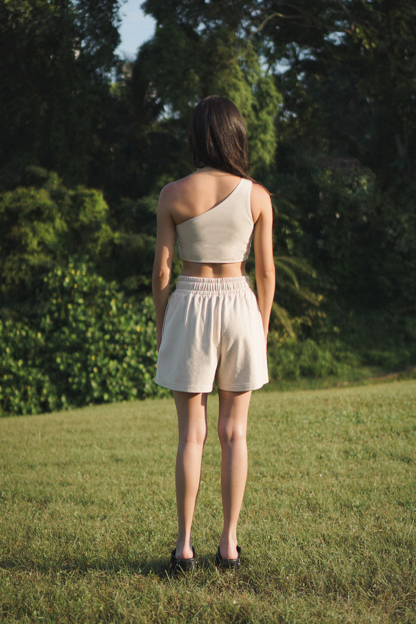 Amalgam porcelain beige pink toga top fitted with comfortable cotton matching set co-ord sweat shorts in porcelain pink beige. back view atheleisure everyday comfort matching set co-ord set.
