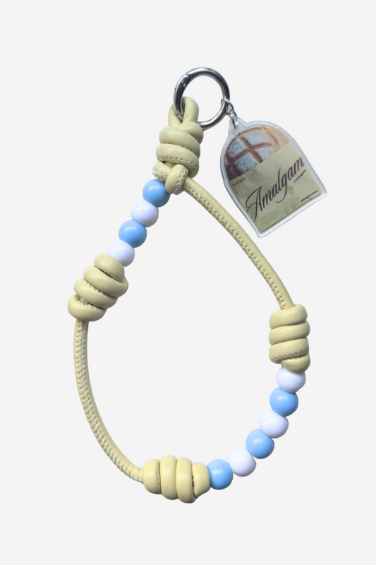 Amalgam Amalgam.store Beaded leather phone strap pastel yellow Bread loaf charms