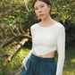 Amalgam Ivory long sleeve cotton scoop back curve front and back bare back design detail crop top and teal green comfortable cotton Sweat Shorts for everyday casual comfort fitted  teal green